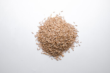 oat seeds heap isolated on white. top view with copyspace