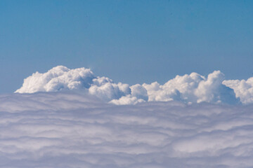 Aerial view of clouds outside of my airplane window on a flight from Richmond to Chicago