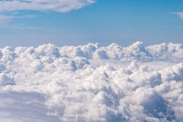 Aerial view of clouds outside of my airplane window on a flight from Richmond to Chicago