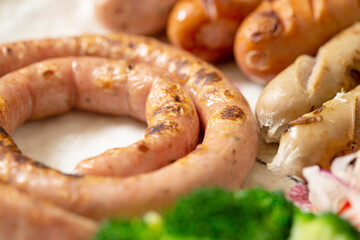 Grilled sausages on a plate