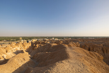 Sunset views across over the oasis town of Al Hasa from Al Qarah hills, Saudi Arabia