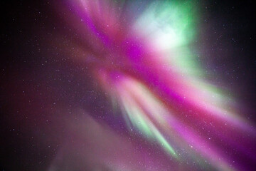 Red and pink Northern Lights explosion