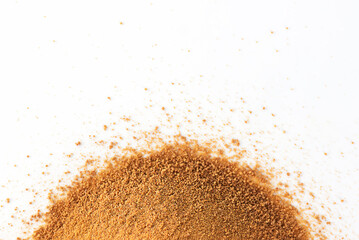 Unrefined cane brown sugar Panela isolated on a white.