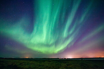 Green sky of Northern Lights in Iceland
