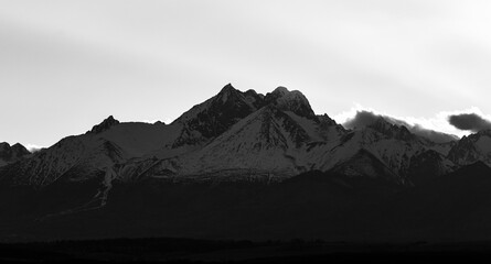 Snow covered mountains peaks, Black and white.