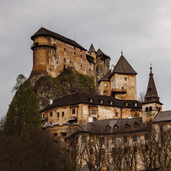 Fototapeta na wymiar Gloomy medieval castle on the mountain, Orava, Slovakia.