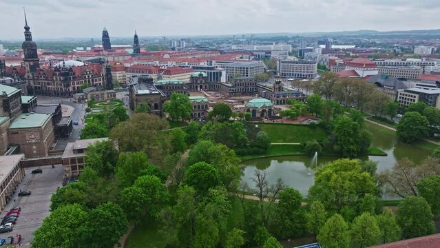 Drone shot of The Zwinger ( Dresdner Zwinger ) , it is a palatial complex with gardens in Dresden, Germany . It is one of the most important buildings of the Baroque period in Germany .