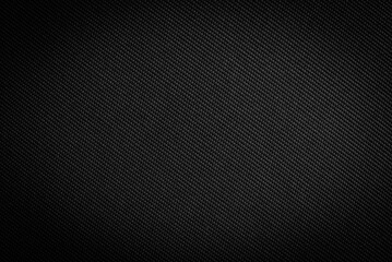 Carbon fiber background. Texture of black fabric for tailoring, Cloth