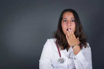 Oh! I think I said it! Close up portrait of lady in white, street style t-shirt cover open mouth by...