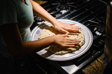 woman baking cookies closeup
