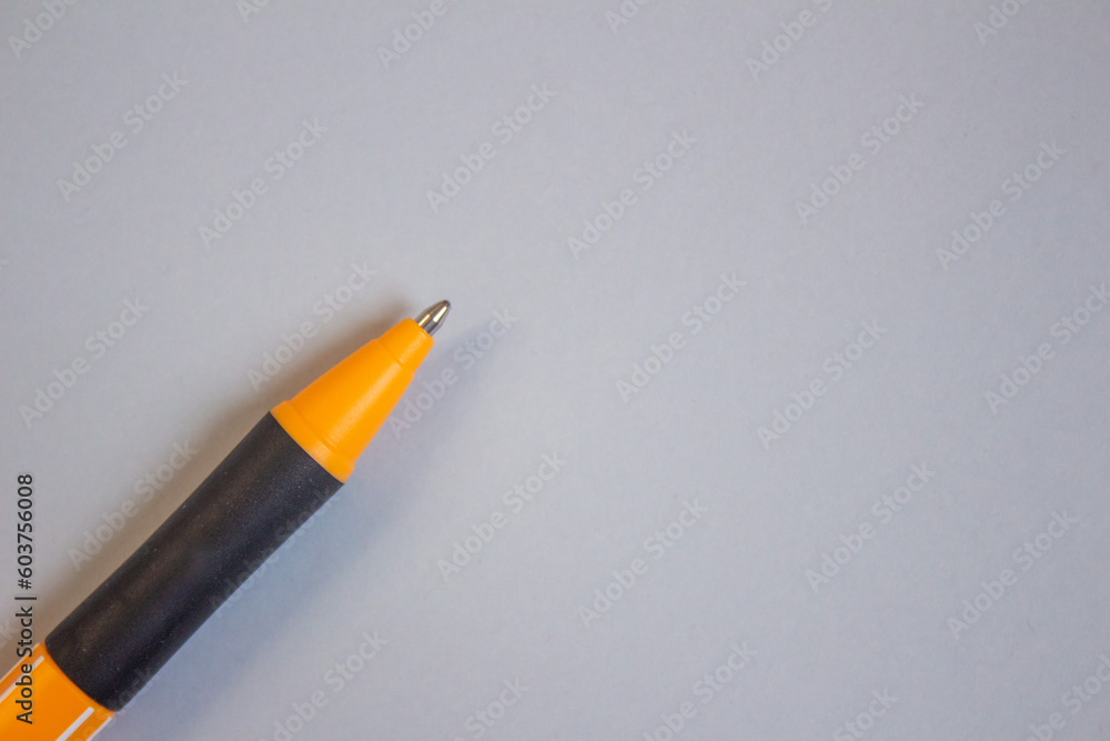 Poster a single pen isolated on grey background with copy space. top view, flat lay.