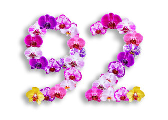 The shape of the number 92 is made of various kinds of orchid flowers. suitable for birthday, anniversary and memorial day templates