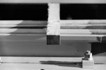 Wooden plank with splinters at construction site