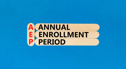 AEP symbol. Concept words AEP Annual enrollment period on beautiful wooden sticks. Beautiful blue...