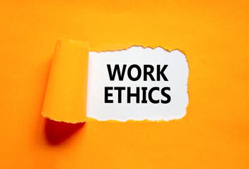 Work ethics symbol. Concept words Work ethics on beautiful white paper. Beautiful orange table...
