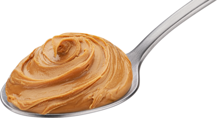 Caramel cream, boiled condensed milk swirl in spoon isolated