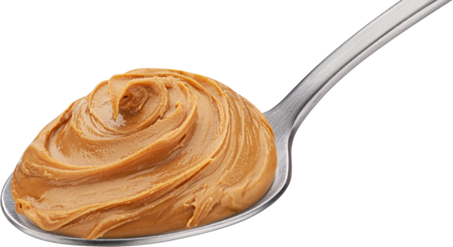Caramel cream, boiled condensed milk swirl in spoon isolated