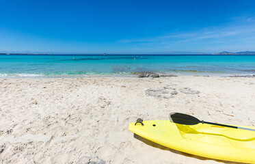 Paddle surf board on the beach of Ses Illetes, on the island of Formentera. Balearic Islands, Spain