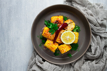 grilled corn with spices, top view, no people, homemade,