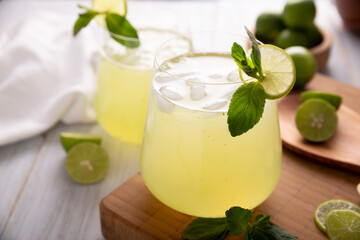 Obraz na płótnie Canvas Homemade lemonade with organic lemons and mint, a popular refreshing drink in many countries. in Mexico it is part of their traditional Aguas Frescas, where it is called Agua de Limon.