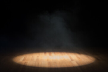 Single focus of light on theater stage with nothing, focus of light on wooden floor and black background. - 603801643