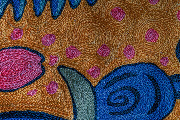 Abstract background closeup of embroidery with art stitches. Rough Coarse thread, thick seams....