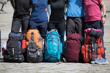 Pilgrims on the Camino de Santiago arrive at the Plaza del Obradoiro because they have finished...