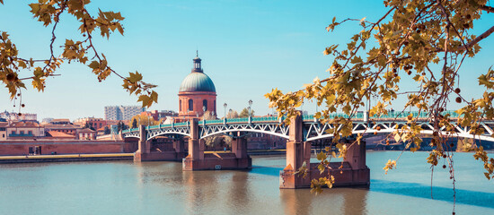 Toulouse city, France. Cityscape with Garonne river and La Grave dome - obrazy, fototapety, plakaty