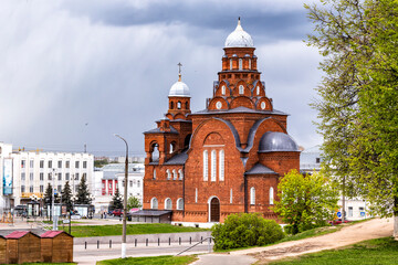 Fototapeta na wymiar Red brick Trinity church in Vladimir, Russia