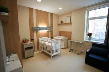 Modern interior of patient room in private children clinic