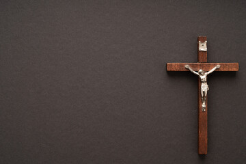 Christian Pentecost. Whit Sunday. A cross with a birch branch on a white, green, red and black background.