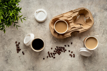 Obraz na płótnie Canvas Many paper cups with coffee. Coffee to go background