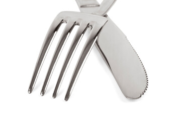 Close up of knife and fork isolated on white