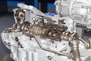 Cross section of a car gearbox. Educational exhibit. Gears, disks and teeth