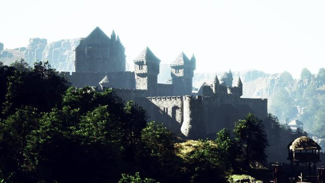 Old ruined castle in the misty mountains