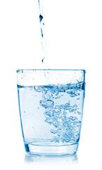 pouring water on a glass on white background.
