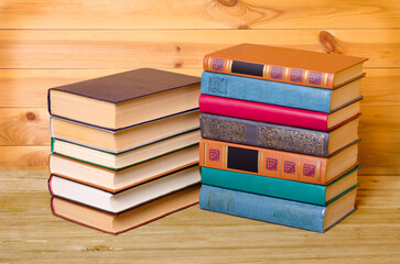 Vintage old books on the wooden table