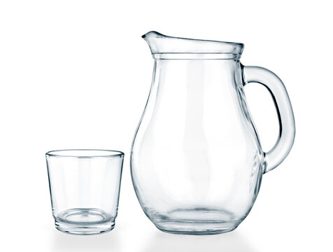 Empty jug and glass on a white background.