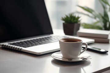 Obraz na płótnie Canvas minimalist office workspace with a laptop and coffee