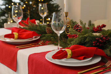 Beautiful table setting with Christmas decor indoors