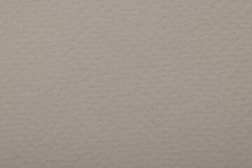 Texture of light grey paper sheet as background, top view