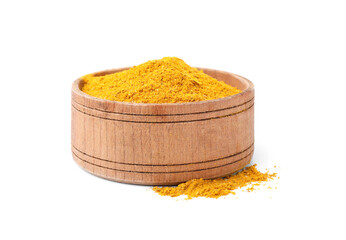 Wooden bowl with curry powder isolated on white