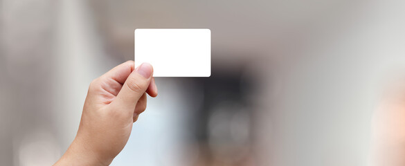 hand holding a credit card/business card with transparency png - easy modification - obrazy, fototapety, plakaty