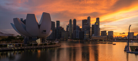 Fototapeta Landscape view of Singapore business district and city at twilight. Singapore cityscape at dusk building around Marina bay. obraz