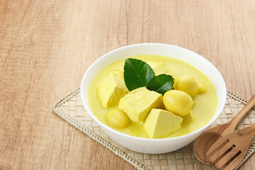 Sayur Terik Tahu Telur Puyuh, made from tofu, quail egg and coconut milk. Indonesian traditional food
