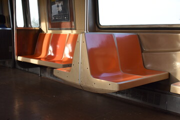 Empty Orange Seats, Riding on the New York Subway Train - obrazy, fototapety, plakaty