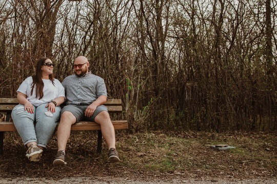 couple sitting on bench