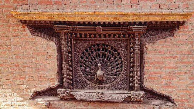 Moving towards the wood carved Peacock Window off of Dattatraya Square, Bhaktapur, Kathmandu Valley, Nepal