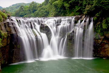 a majestically beautiful waterfall in Taiwan