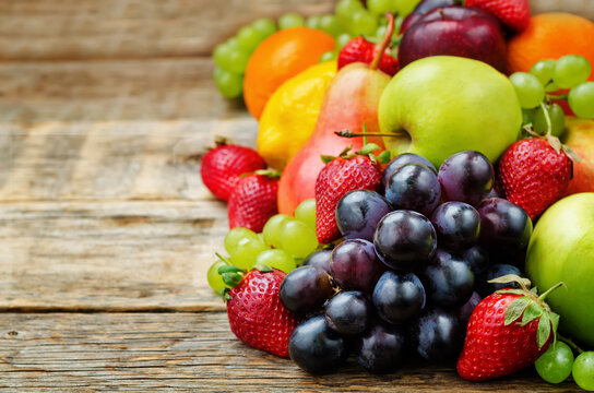 Fruits. Mango, Lemon, Plum, Grape, Pear, Orange, Apple, Banana, Strawberry. The Toning. Selective Focus